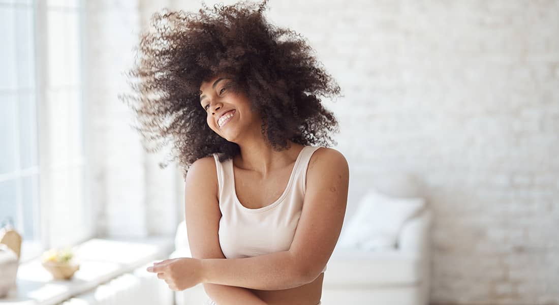 Mixed Race Women Dancing in Her Bedroom Portrait
