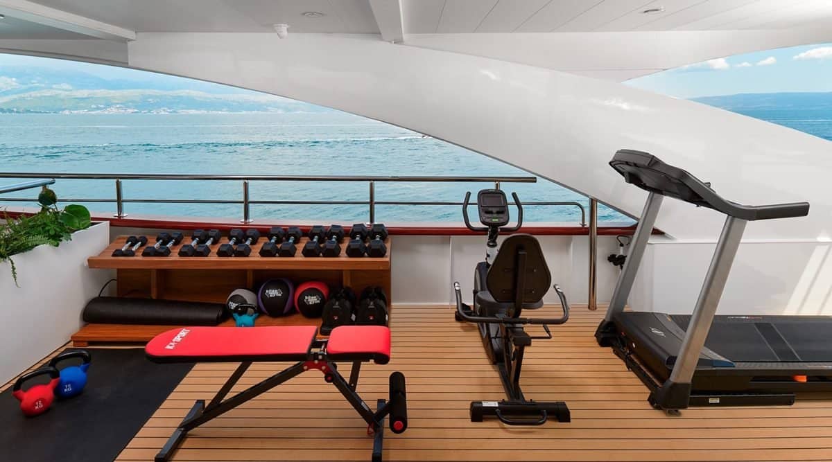 Fitness center on board luxury yacht charter Ohana