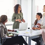 Day-of wedding coordinator team meeting before a wedding