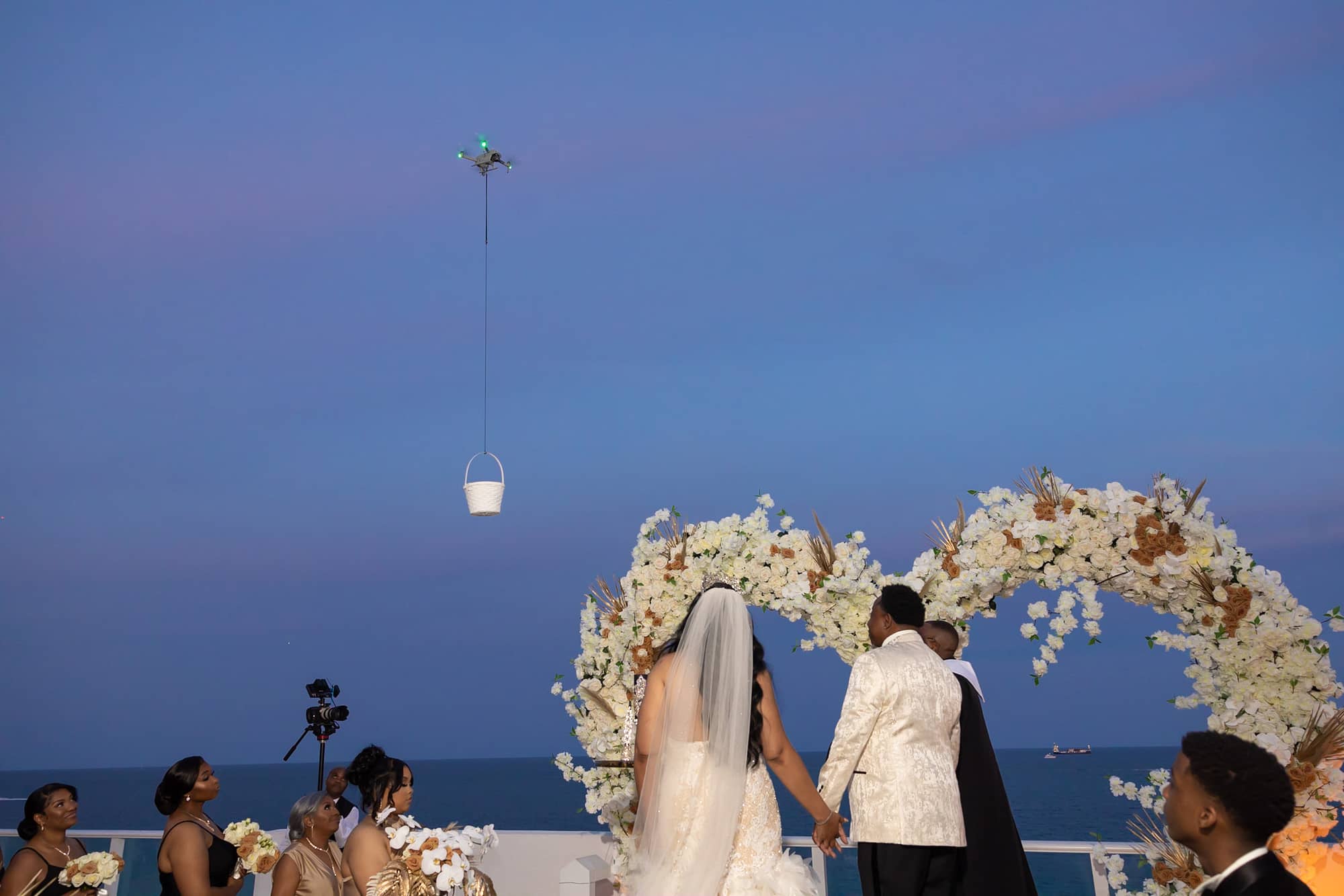 Bride and Groom Exchange Vows in Sunset Ocean Front Cerremony