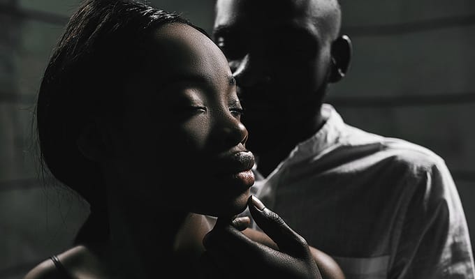 Man and Woman Intimate Black and White Shadow Portrait Hand on Face