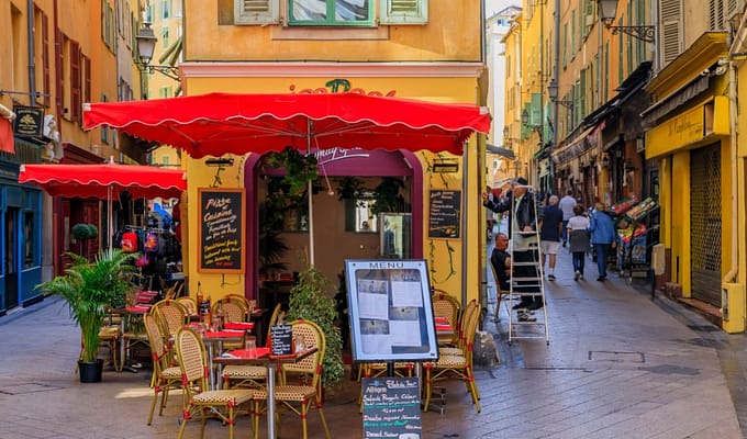 The pedestrian zone, commercial and cultural landmark with restaurants and shops in traditional houses in the French Riviera