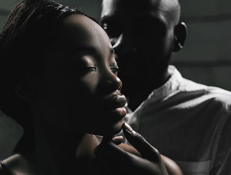 Man and Woman Intimate Black and White Shadow Portrait Hand on Face