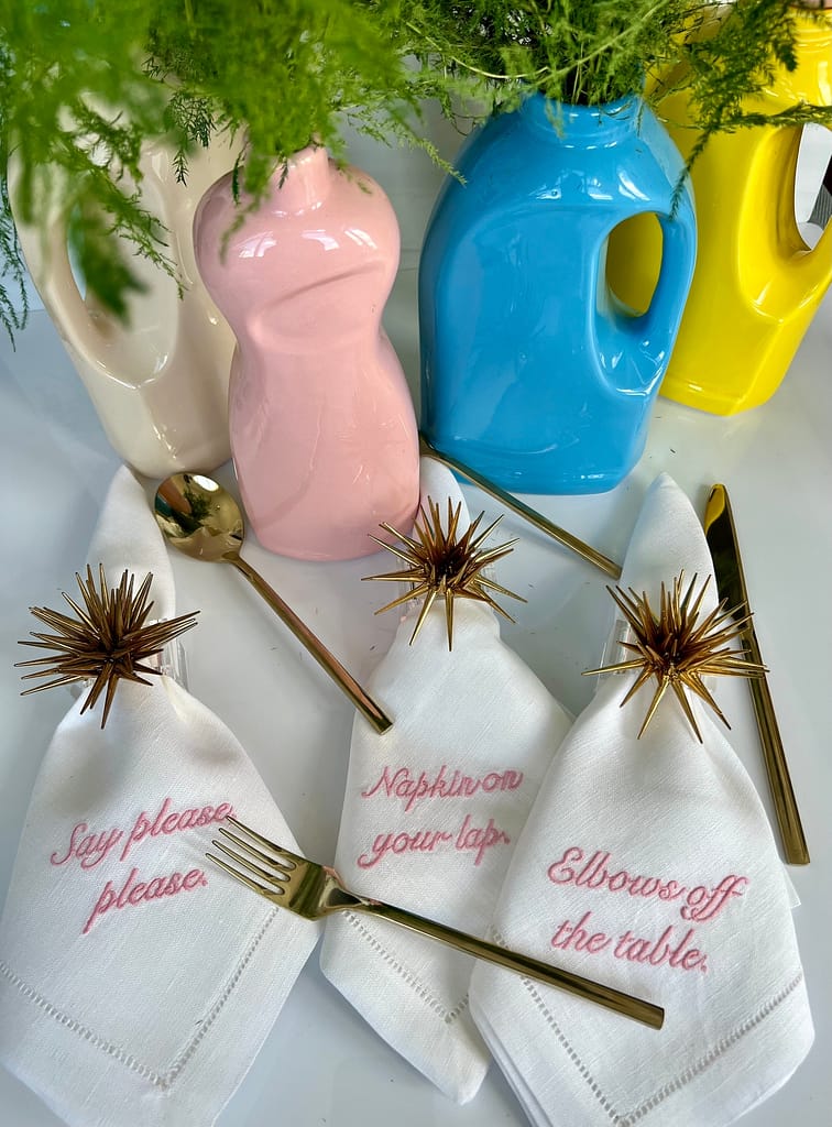 The “cheeky” table setting is designed to represent moms in all their various shapes, forms, sizes and colors. Included are body part vases from Anissa Kermiche.